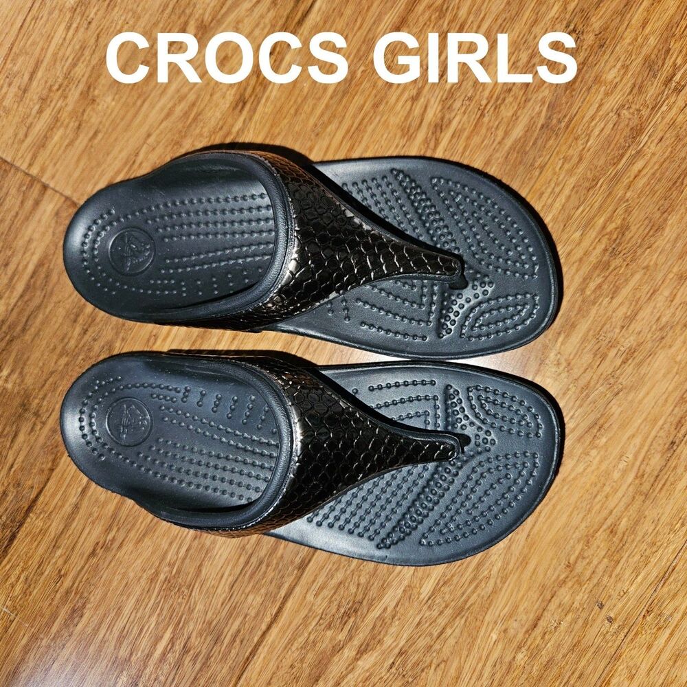 Girls size 4 NWOT Crocs Sandals with Silver Decoration